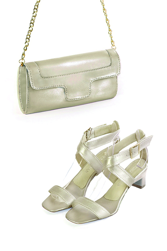 Women's gold luxurious elegant clutch for ceremonies, weddings and evenings out. - Worn view